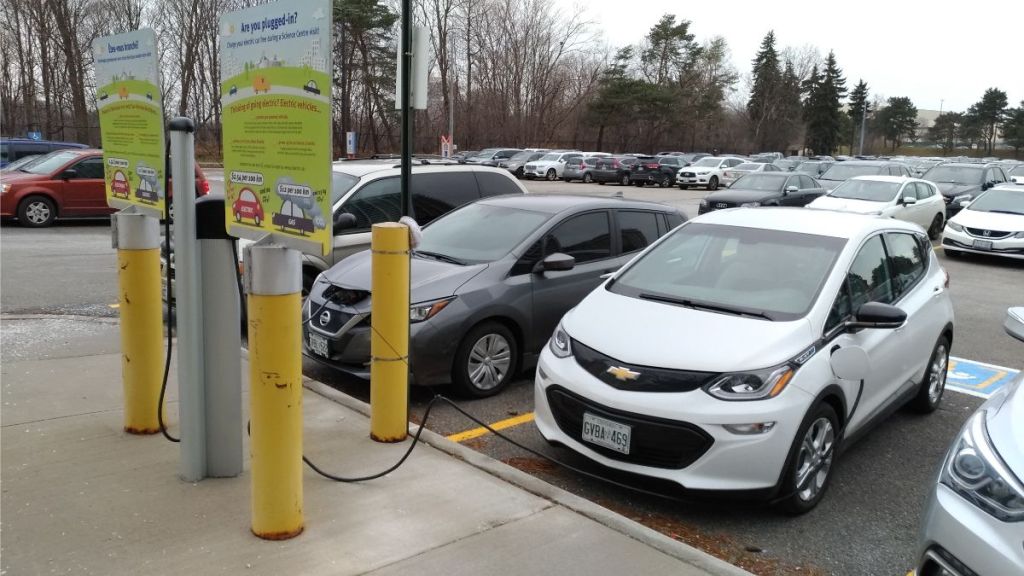 Chevrolet Bolt plugged in at a charging station