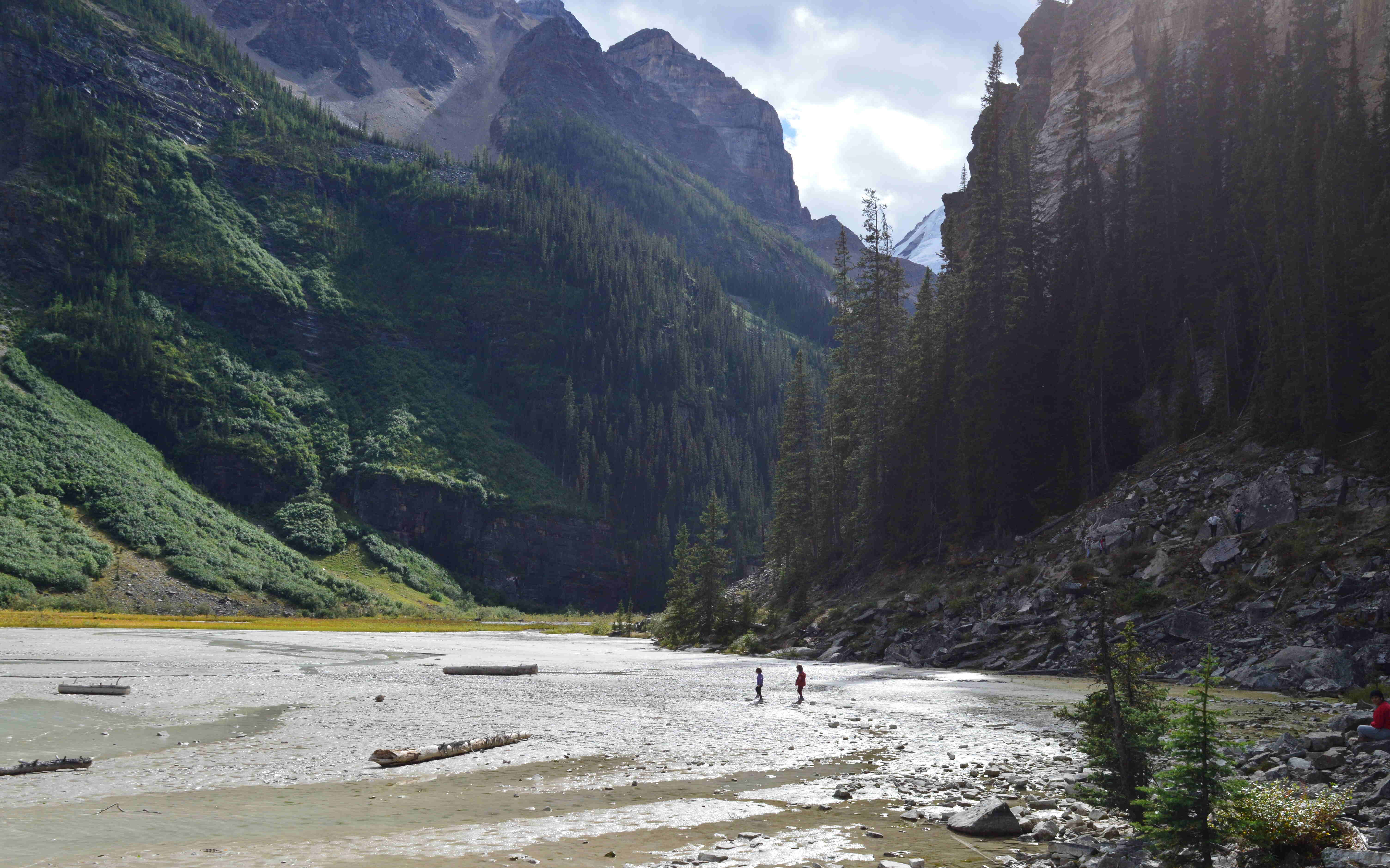 Two girls playing in mountain landscape