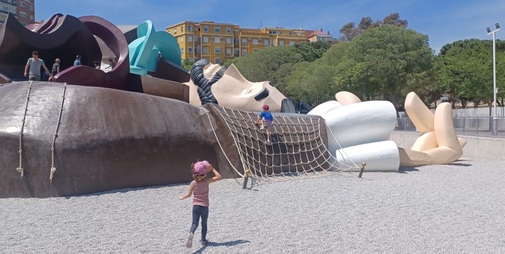 Children running to playground on sand
