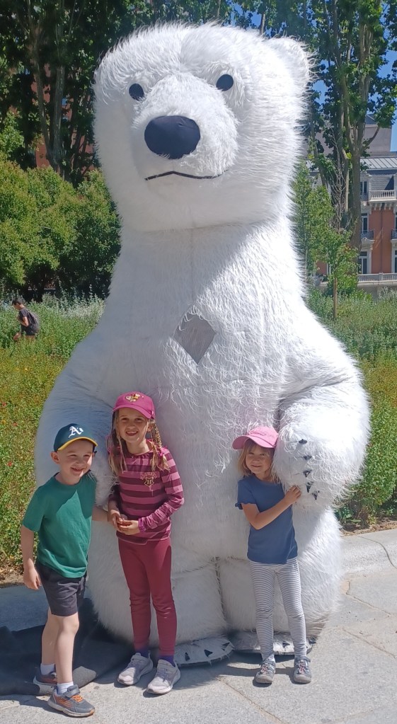 Children with polar costume street performer