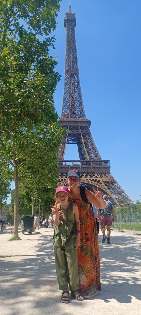 Daughter and mother at eiffel tower